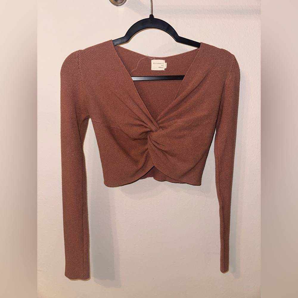 Ribbed twist front long sleeve sweater